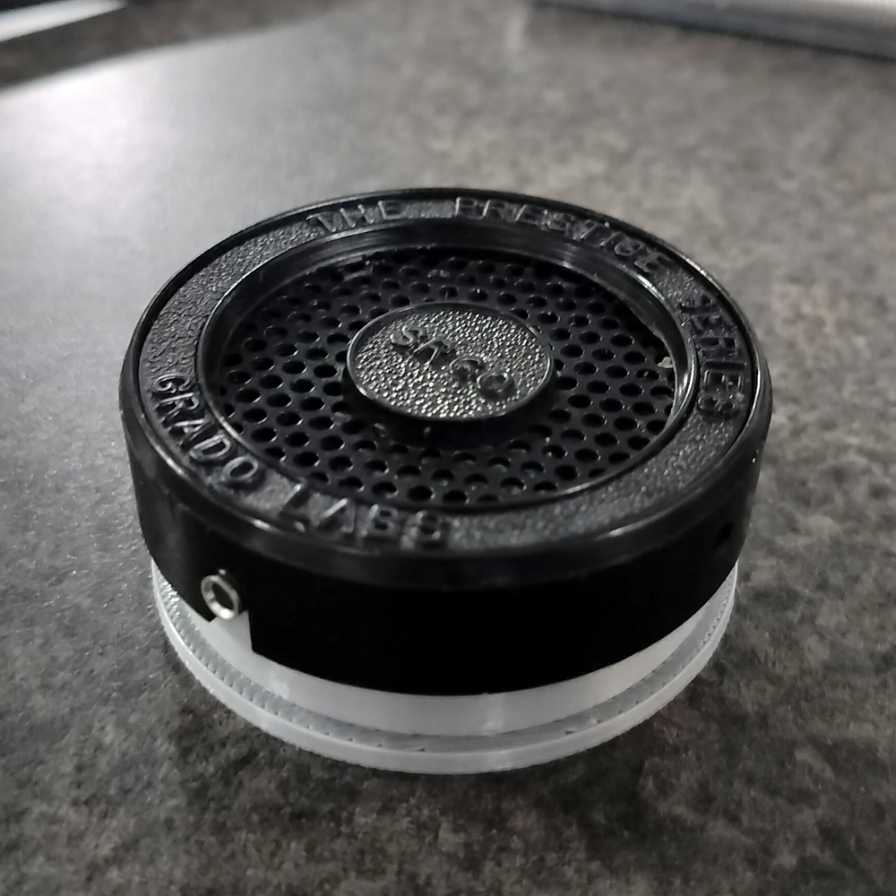 3D printed custom housing mated to original Grado ear cup.