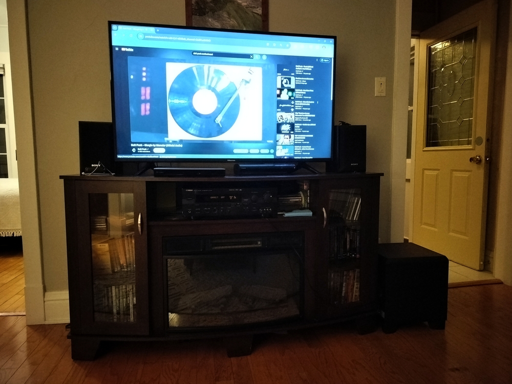 Stereo setup with sub and TV.